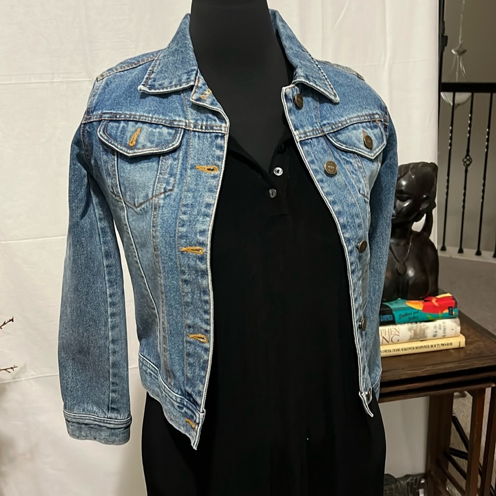 A Jean jacket is essential by Over Lap.